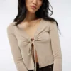 Ardene A.C.W. Tie Front Crop Top In Beige | Size | Polyester/Elastane -Eddie Bauer Store https3A2F2Fwww.ardene.com2Fon2Fdemandware.static2F 2FSites master catalog2Fdefault2Fdw929bfdd22Fimages2Flarge2F2B AP30488 05 2da6d729 40b2 476b b09a 5c3ff8f50109.jpg 640x
